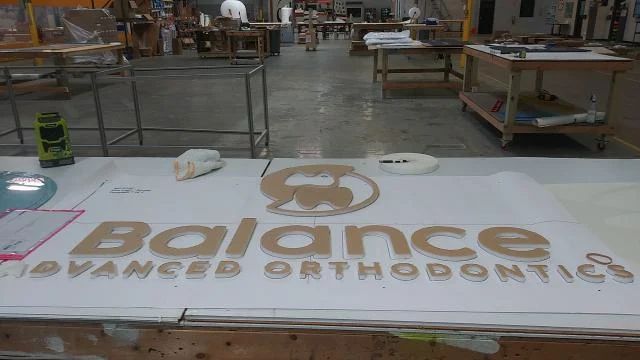 Balance Advanced Orthodontics lobby logo letters cut for office wall in metro Atlanta