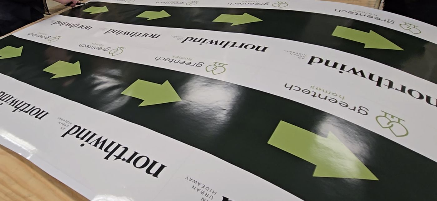 Printed directional arrow panels for Northwind and Greentech Homes new-home communities