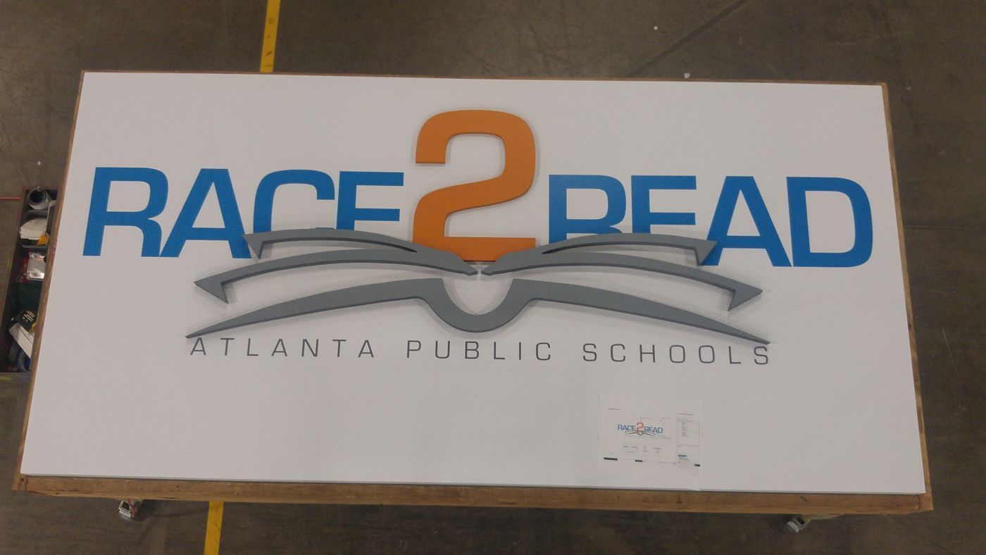 Race 2 Read Atlanta Public Schools dimensional logo sign with 3D letters